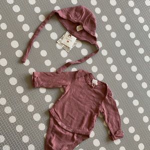 Kate Quinn Bonnet and bodysuit